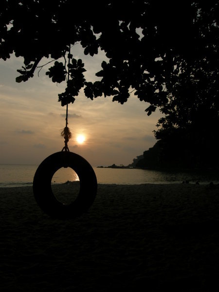Sunset by one of the swings