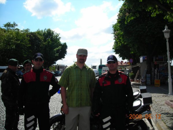 With the motorcycle cops