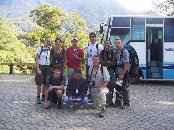 8 plus guide preparing for Mount Kinabalu (behind us)