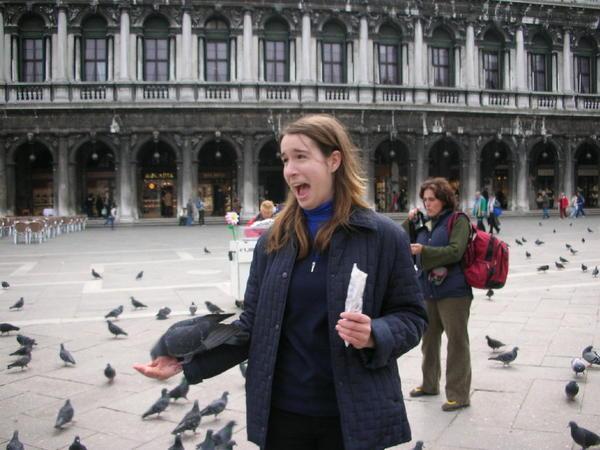 A stupid tourist with a pigeon