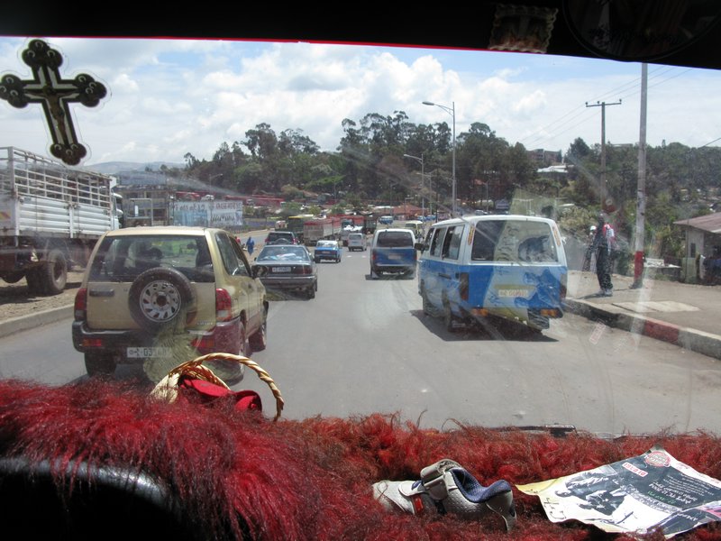 View from the front of a minibus, with very little traffic