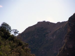 Trekking to Aguas Calientes. First glimpse at Machu Picchu
