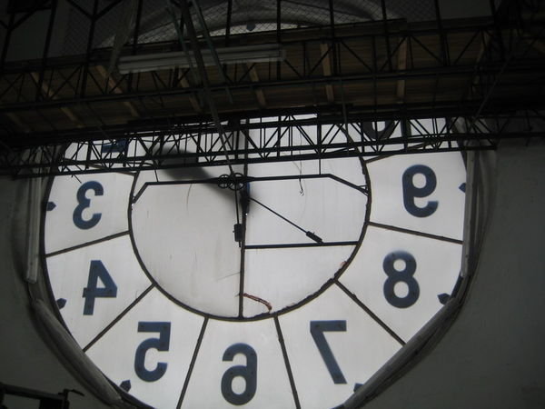 Behind the clock tower