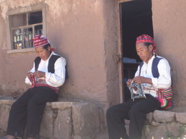Locals weaving on Taquile