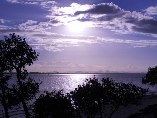 Sunset over the Glass House Mountains from Bribie Island