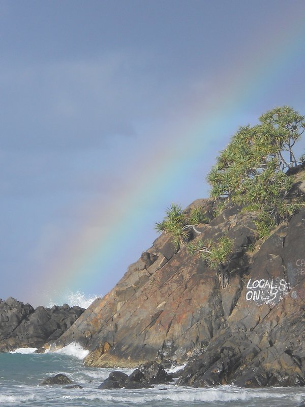 Rainbow over the rocks.