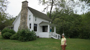 Trish in front of Wilder homestead