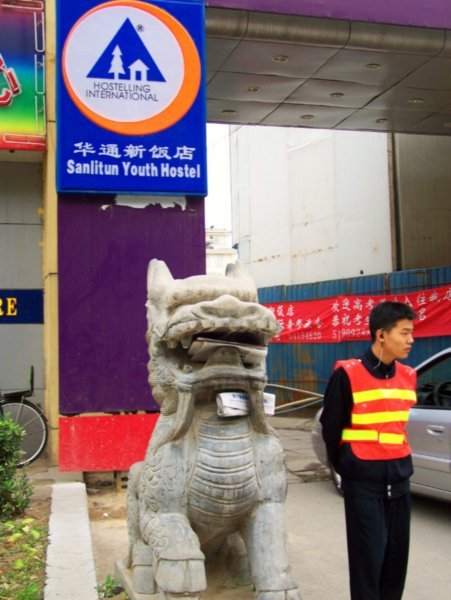 hostel sign, dragondoggy, and guard