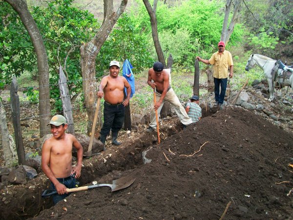 the ruiz's digging by the creek