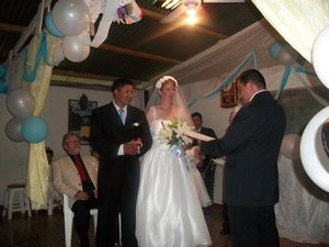 bride groom and pastor