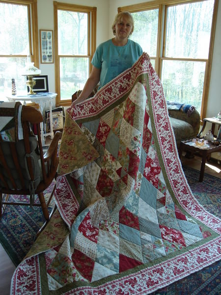 Marilyn and one of her many beautiful quilts