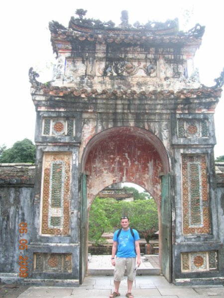 A big arch near a big Pagoda near Hue