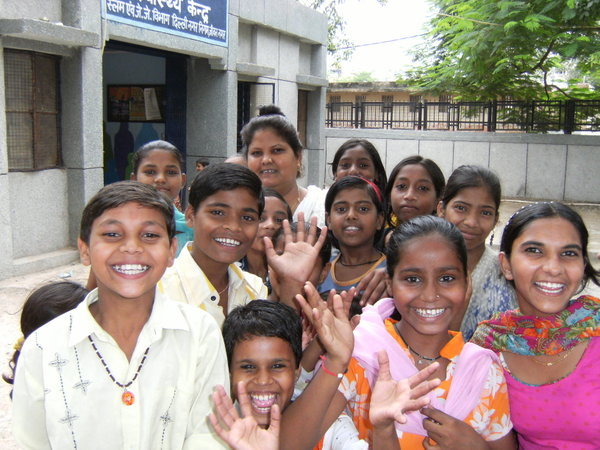 Suneeta (Health Care Volunteer) and some of the children