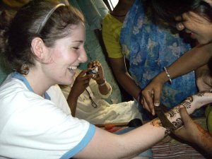 Madleine receiving the full henna treatment from the women of the centre