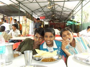 Chandan, Massum and Sonu enjoying lunch at the zoo