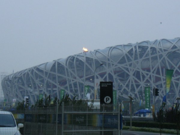The amazing Bird's Nest Stadium and Olympic Torch