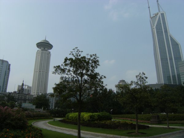Shanghai: Gardens in Huangpu District - Shimao International Plaza on the right