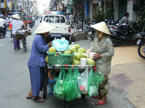 Saigon: Two market sellers having a good ol' chinwag