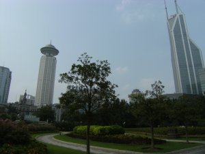 Shanghai: Gardens in Huangpu District - Shimao International Plaza on the right