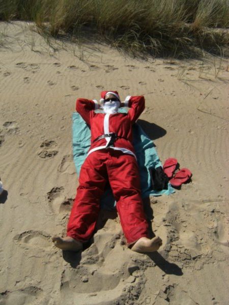Santa enjoys a hard earned lie down!