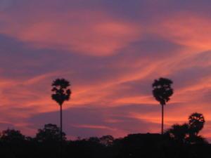 Sunrise behind Angkor Wat