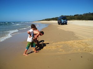Digging at the Beach - Watch out for that bus!