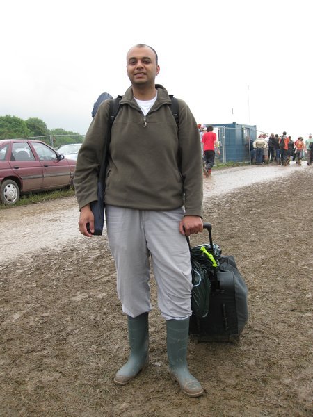 Rupesh - 'Who's Idea Was It To Bring a Wheely Bag In The Mud??!'