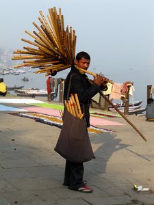 Musician with sacred Flute Tree of Varanasi
