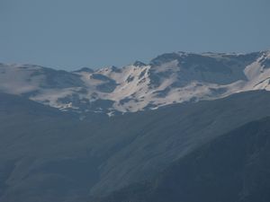 82 Zooming in to the snow capped mountains