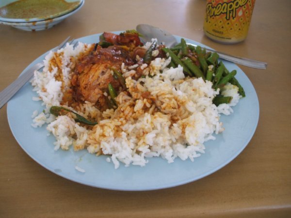 First meal in malaysia spicy chicken and rice thingy was the name on the menu