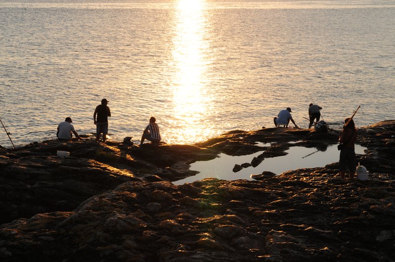 sunset fishermen