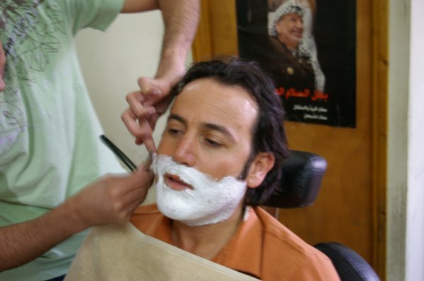 Adri gets shaved with Arafat