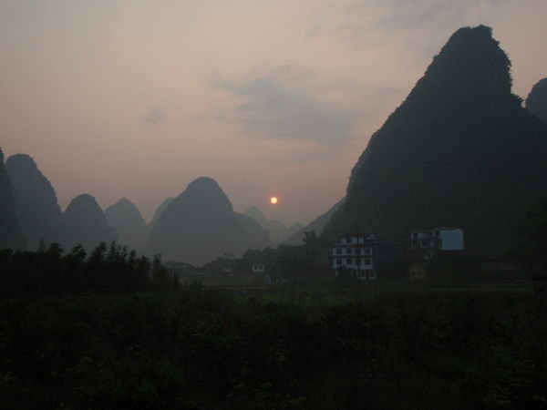 Sun rising over yangshuo