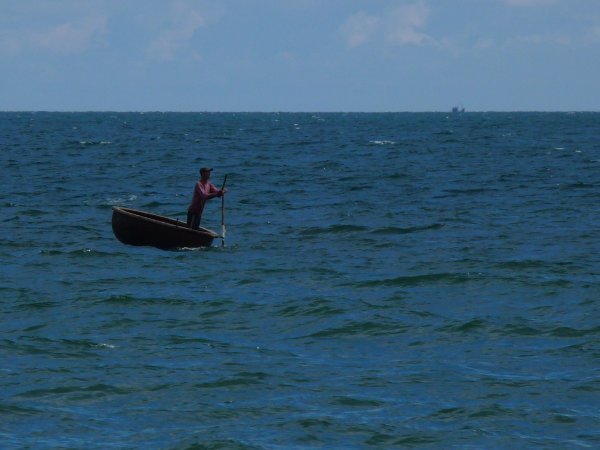 fishing in a round boat