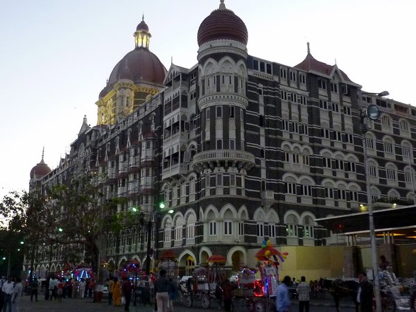 The Taj hotel in the evening - surrounded by wonderfully garish horse-drawn carts