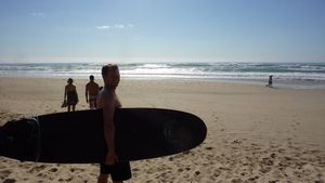 Eric heading out with Woodie at Byron Bay