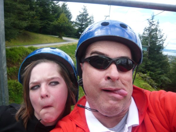 Stressed luge riders on the chairlift for another run