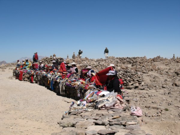 Local women waiting to flog us stuff at the top of the highest pass (4,200m)