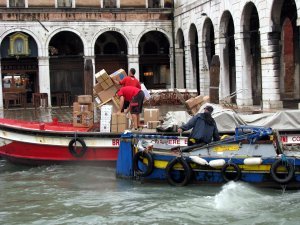 Delivering goods to stores on the rainy morning we were leaving Venice