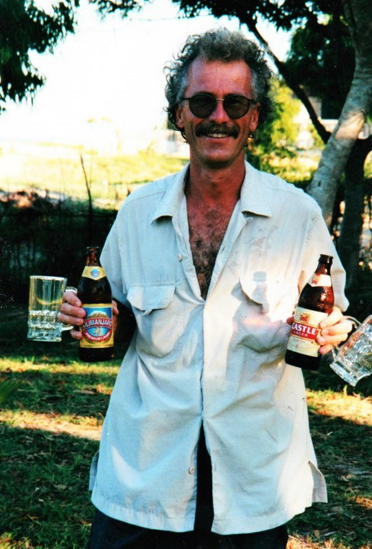 Ed enjoying his beer outside Dar Salaam