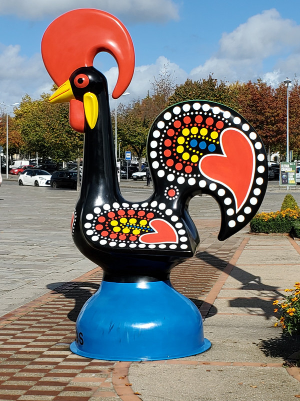 Rooster legend, and these larger than life-size are all over the city 