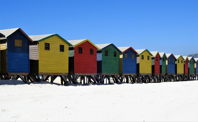 Colorful beach shacks for changing in Muizenburg