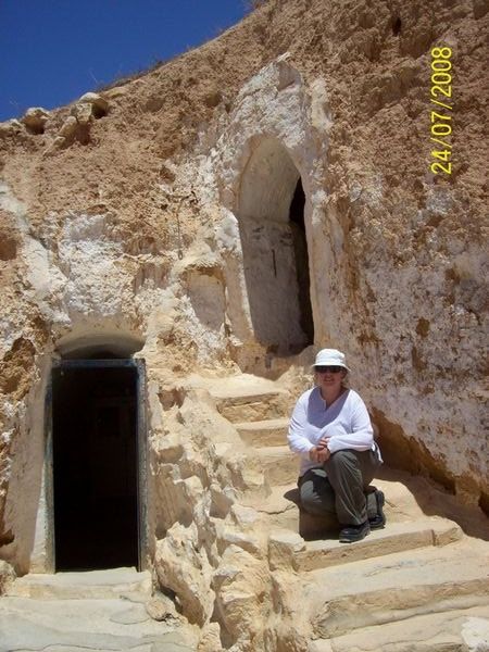 Sitting by a Berber house entrance