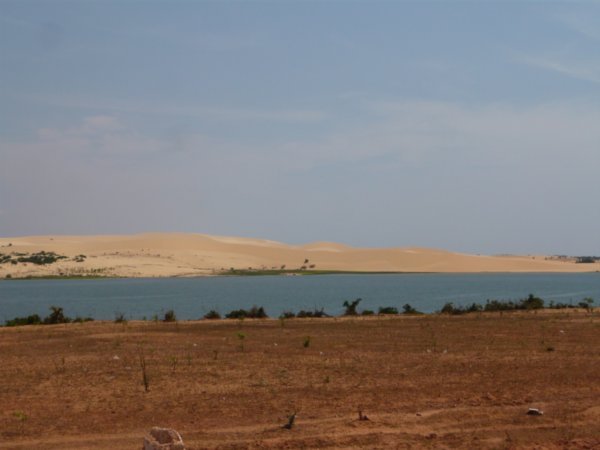 White Sand Dunes of Muine Across The Lake