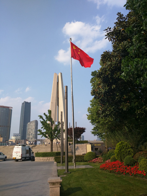The Monument to the People's Heroes and th Chinese flag