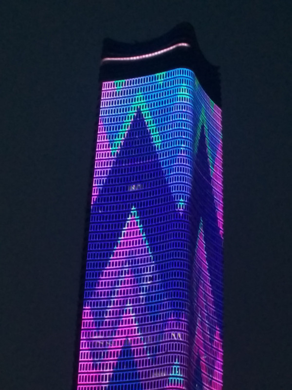 One of the buildings in the Pudong area lit up for the night