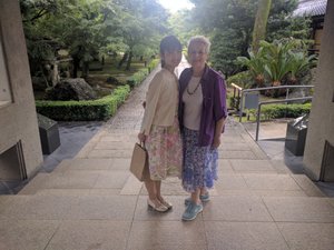 Keiko & Michelle on the steps of the Shokokuji Jotenkaku Museum after the storm