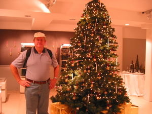 Grandpa with a Christmas tree