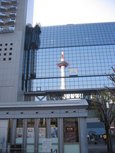 Reflection of Kyoto Tower in the station building