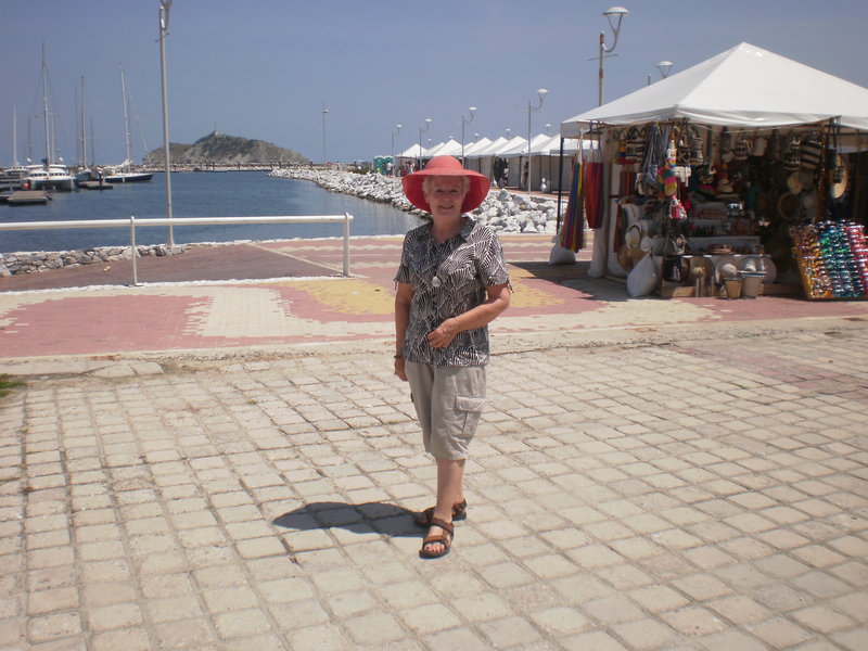 Michelle with Santa Marta Marina & market stalls in the background